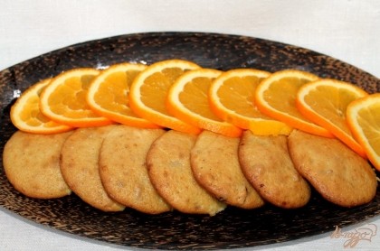 Готово! Готовое апельсиновое печенье выкладываем на блюдо и подаем к столу. Приятного аппетита.
