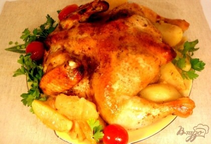 Готово! Подавать курицу с картофелем, маринованными овощами и зеленью. Дополнительно можно подать соус ткемали. Приятного аппетита!