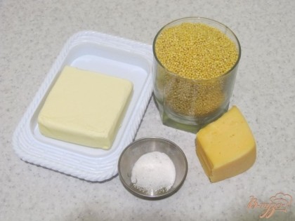 Чтобы приготовить пшенную кашу в горшочках, буду использовать такие продукты: пшенную крупу, масло сливочное, сыр твердый.